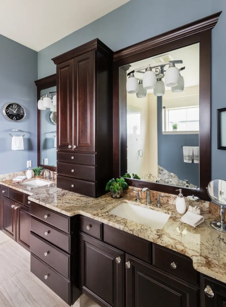 double mirror and cabinets in a modern bathroom after its remodeling.