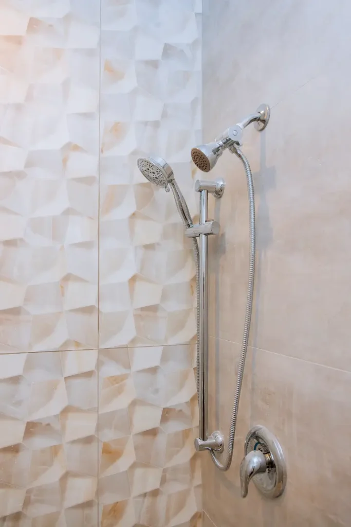 Decorative ceramic shower wall tiles.
