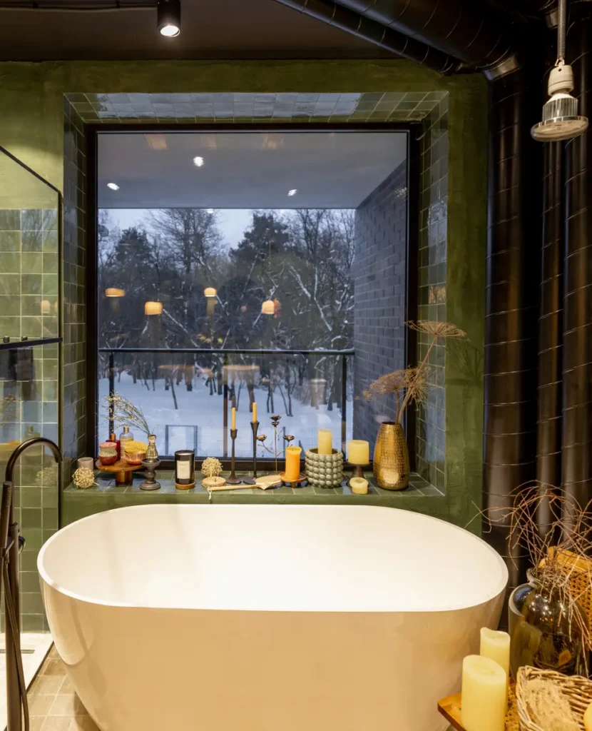 a modern walk-in bathtub with green tones.