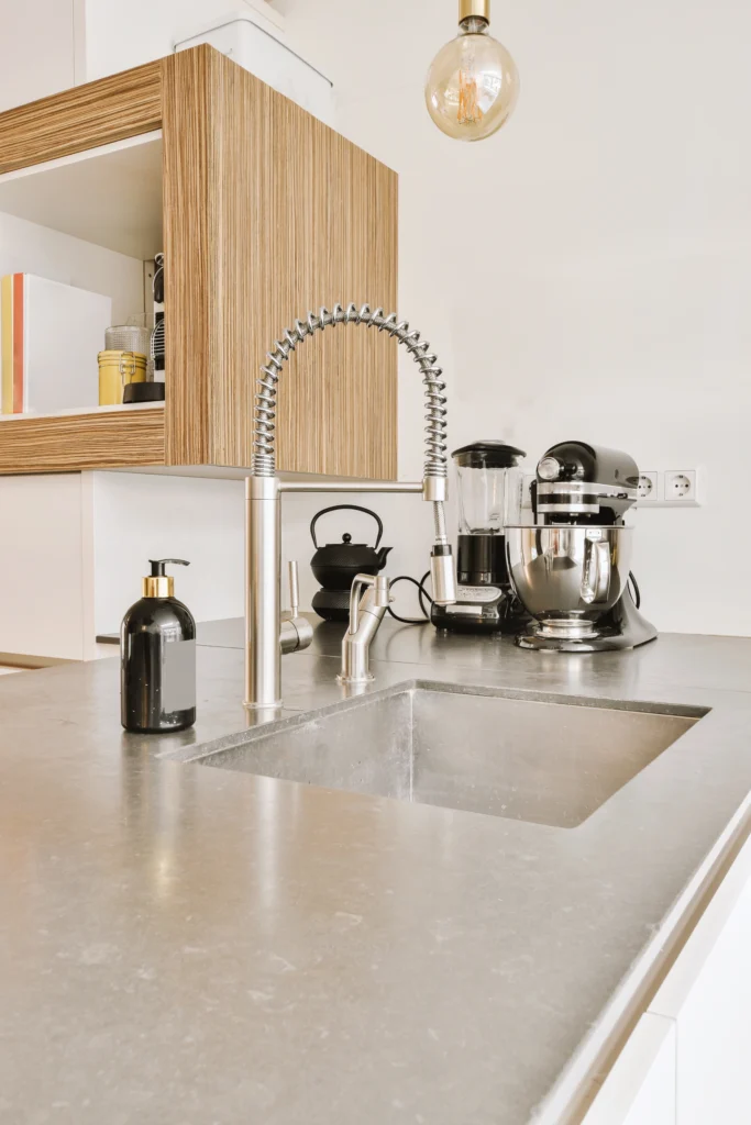 Fully installed countertop with sink in modern kitchen.