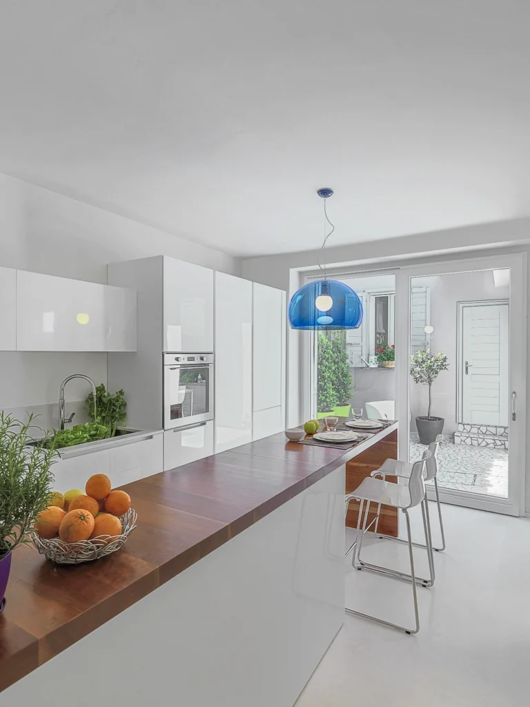 Kitchen island installation with under-counter lighting.