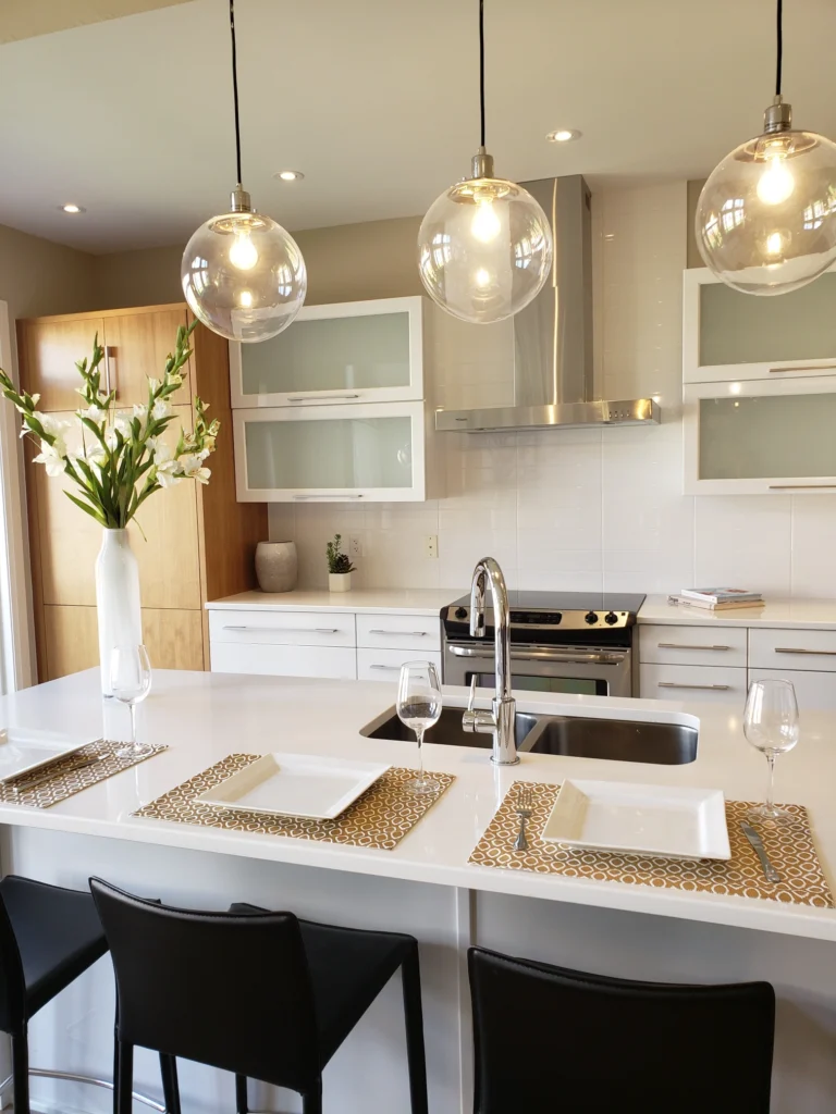Finished kitchen island with built-in sink and barstool seating.