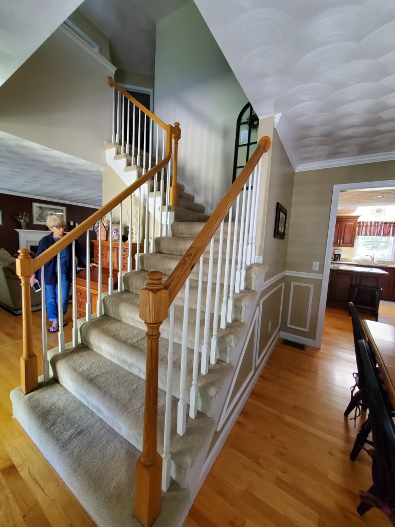 Stairs and handrails installation in the living room.