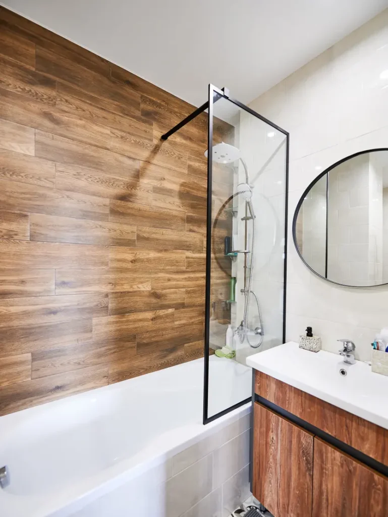 luxury bathroom with the walk-in bathtub with a shower.