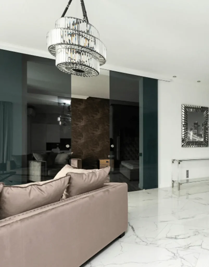 Glossy white porcelain tile flooring in modern living room.
