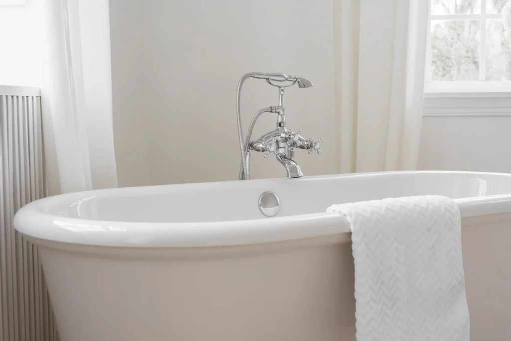 A freestanding bathtub ready for installation, highlighting the type of tub often used in bathroom remodeling projects. This image showcases a potential outcome of a professional tub installation.