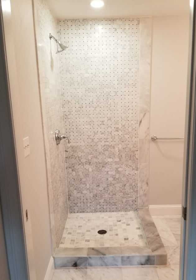 space-saving shower installation in a compact modern bathroom.